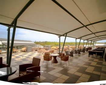 Mist rooftop bar terrace with tables and open views