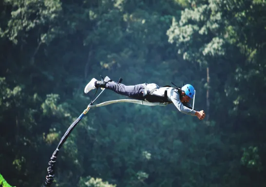Guest leaping from the free fall tower