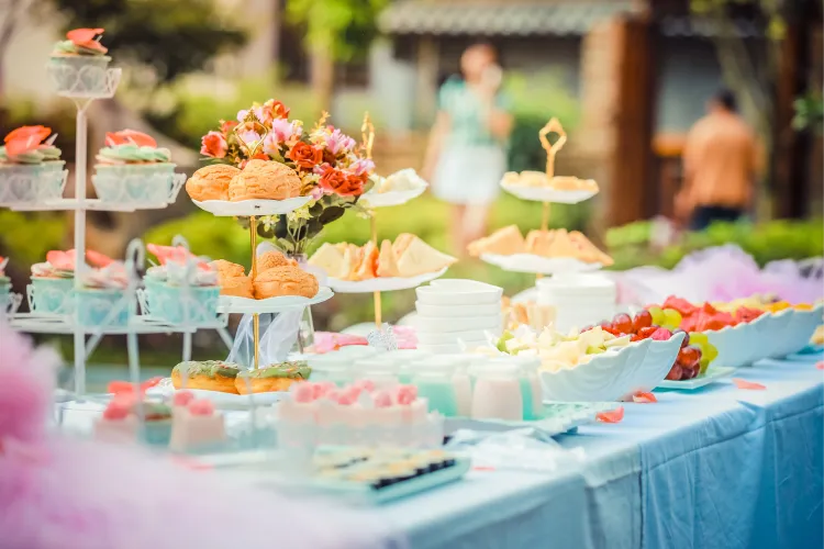 Dessert table with cupcakes at a baby shower