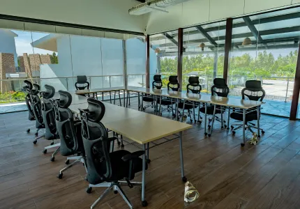Citrine glass-walled meeting room