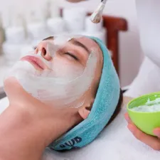 Face mask being applied during a spa facial