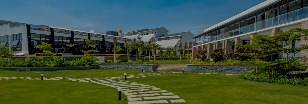 Lawn and stepping-stone path in front of the resort villas