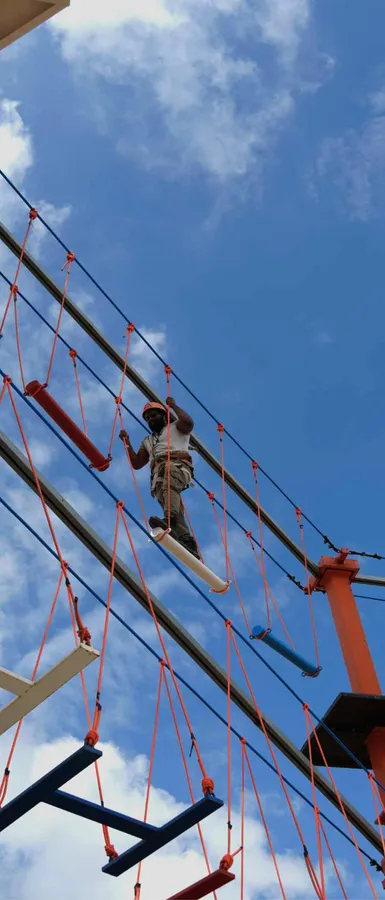 Guest crossing the high rope course