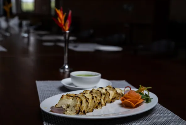 Plated dumplings and soup served at Saffron restaurant
