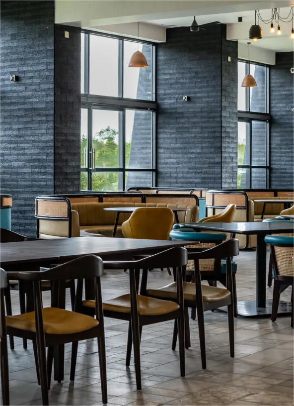 Restaurant lounge seating with green sofas