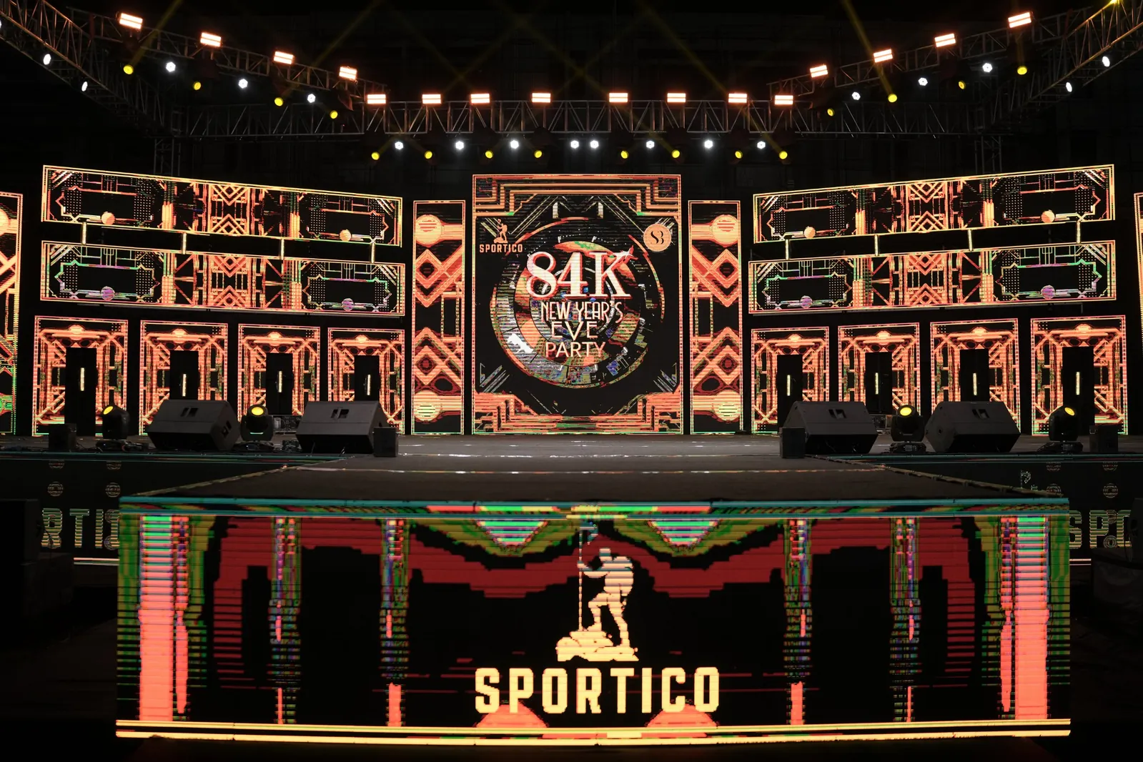 New Year's Eve stage with LED screens and lights at Sportico Resorts near Bangalore