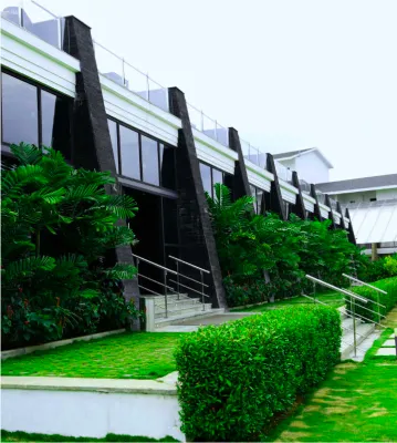 Rooms with balconies overlooking greenery at Sportico Resorts near Bangalore