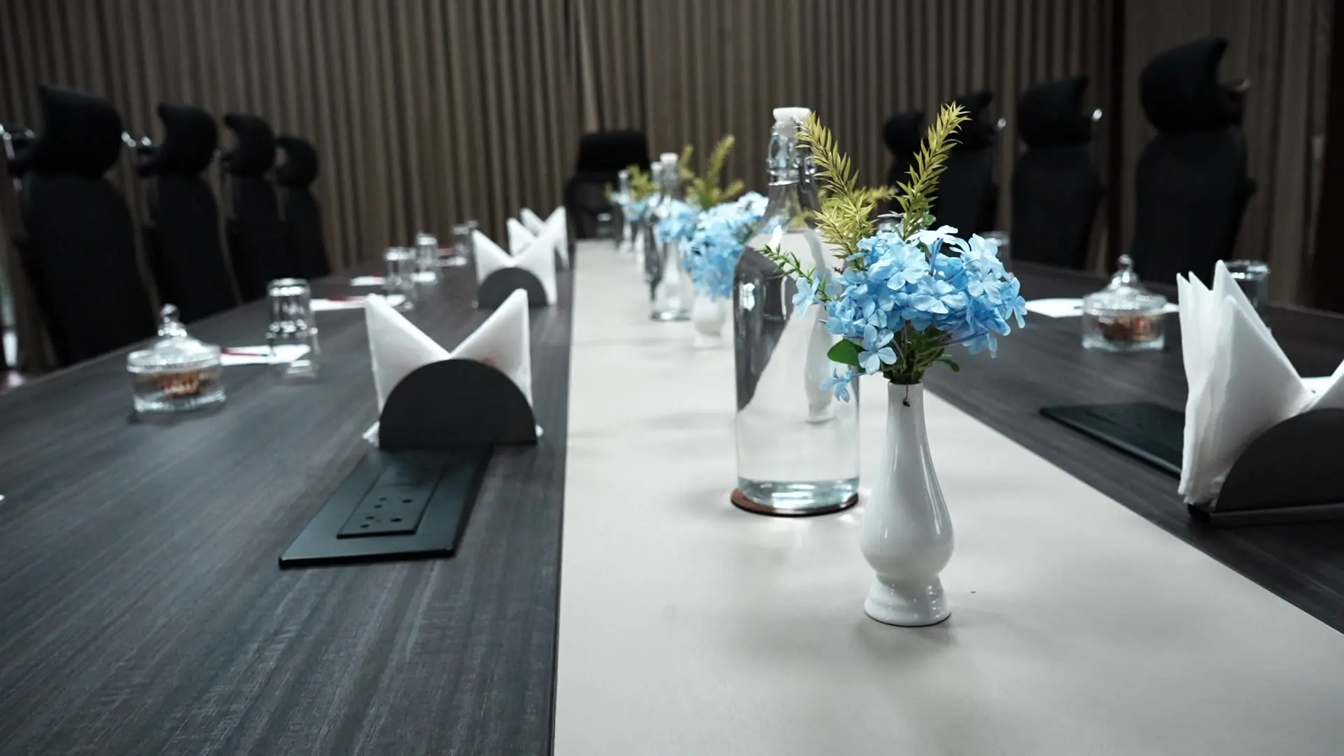 Boardroom with long table at Sportico Resorts