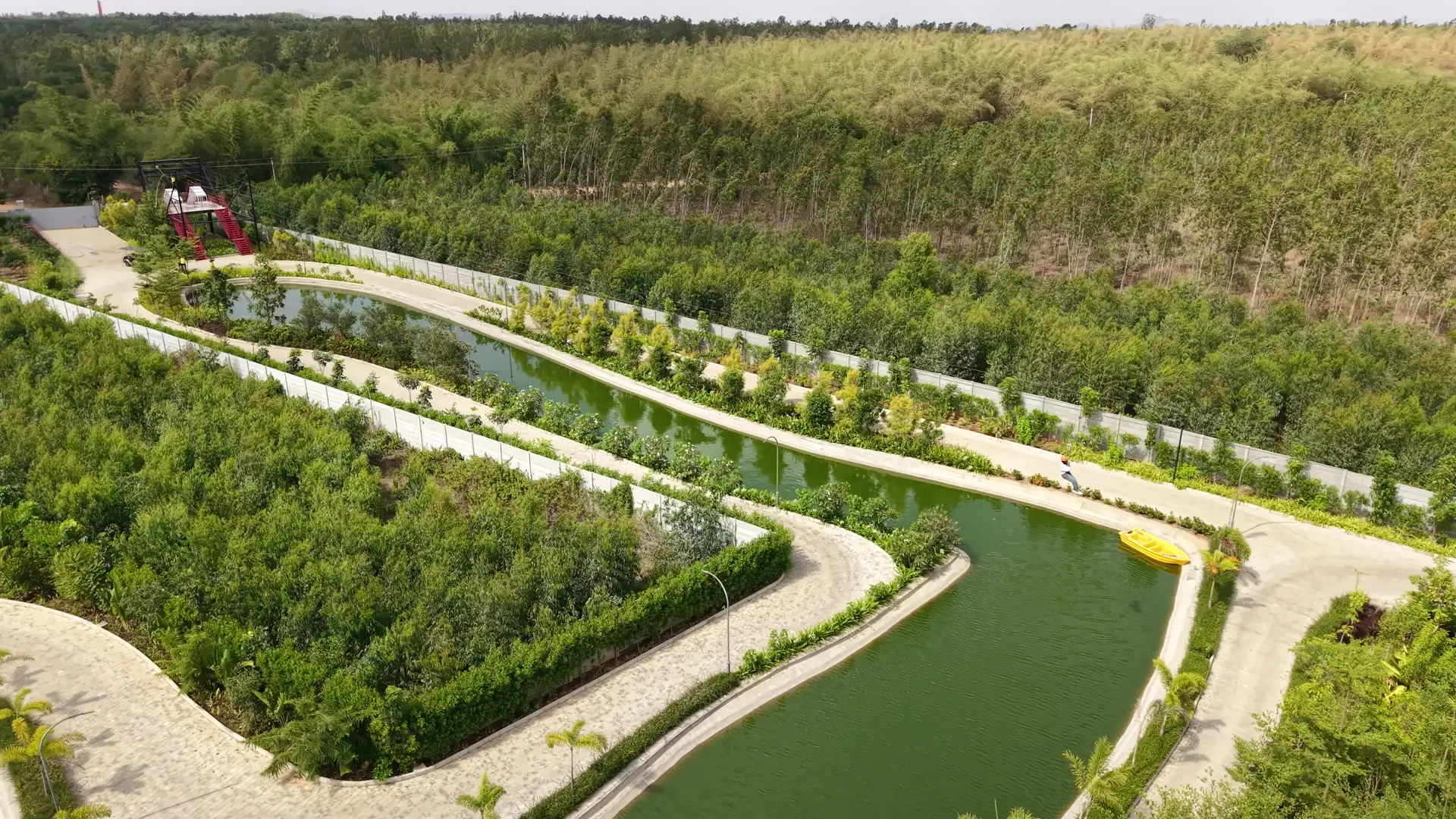 Resort lake and lakeside path for kayaking at Sportico