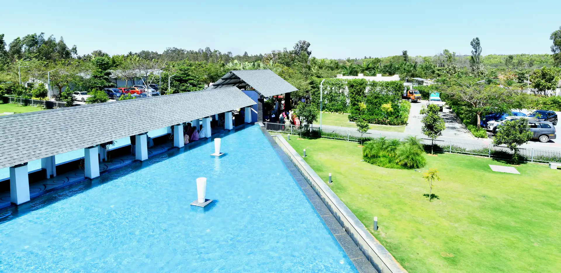 Pool and pavilion at Sportico Resorts near Malur